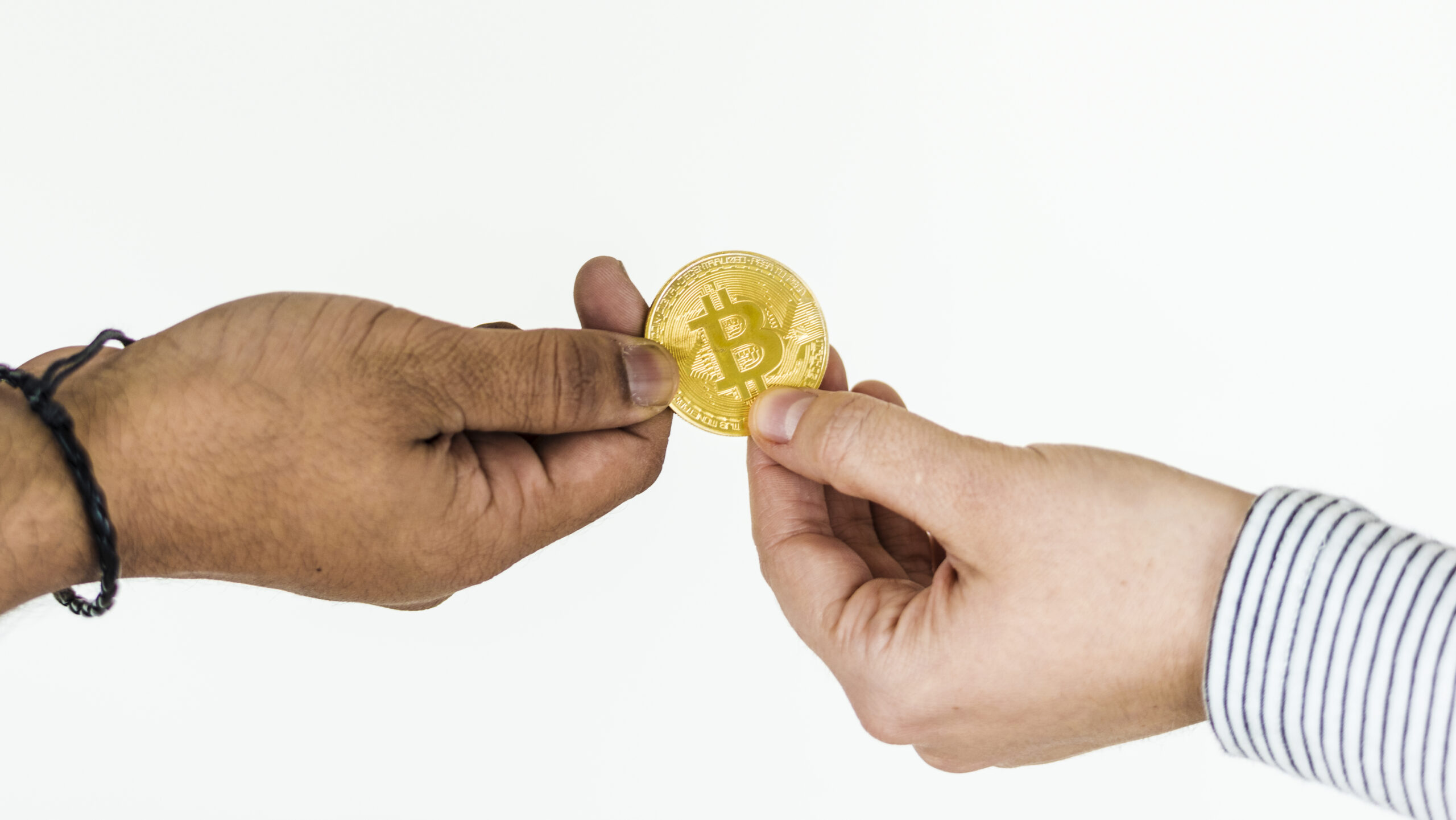 closeup-exchanging-bitcoin-isolated-white-background-scaled.jpg